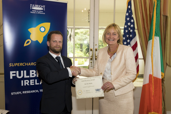 James receiving his Travelling Studentship award from NUI Chancellor Dr Maurice Manning at the 2016 NUI Awards Ceremony