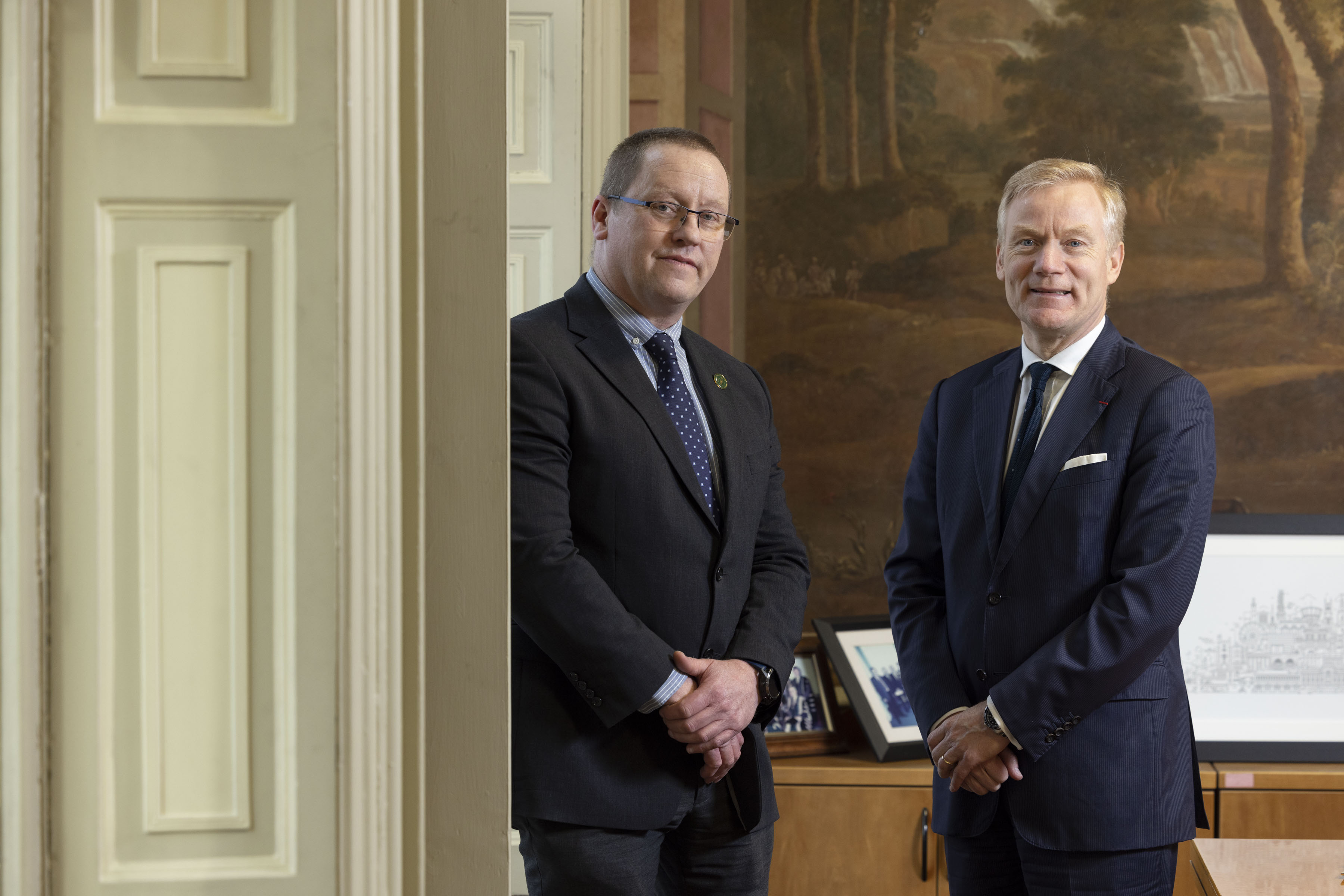 Dr Patrick O'Leary and H.E. Vincent Guérend standing in the Registrar's Office of NUI