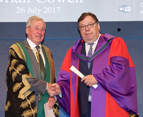NUI Chancellor Presenting Dr Brian Cowen Honorary Conferring with his honorary Doctor of Laws Degree