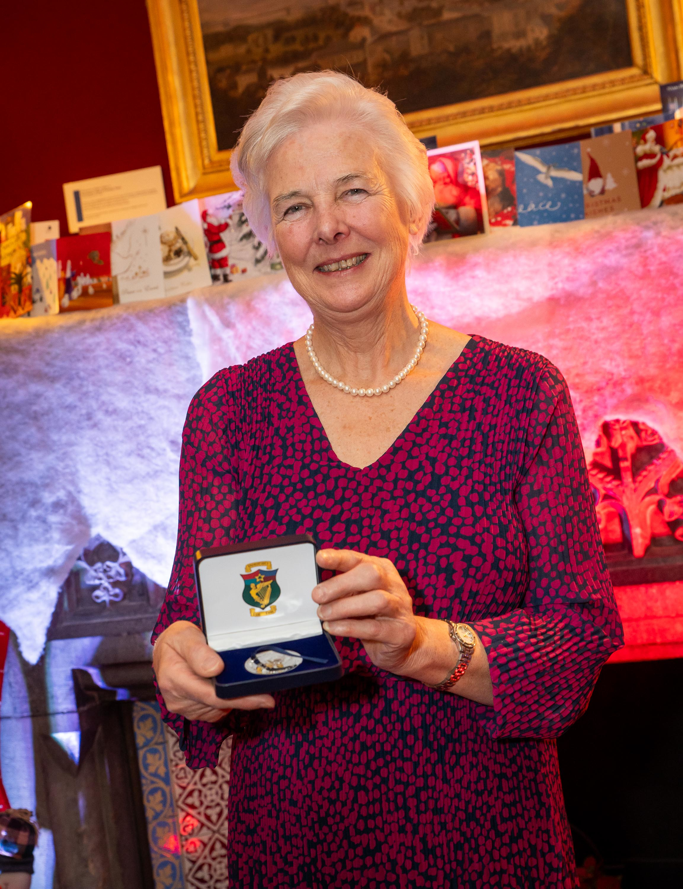 Dr Catherine Day with the inaugural NUI Whitaker Medal